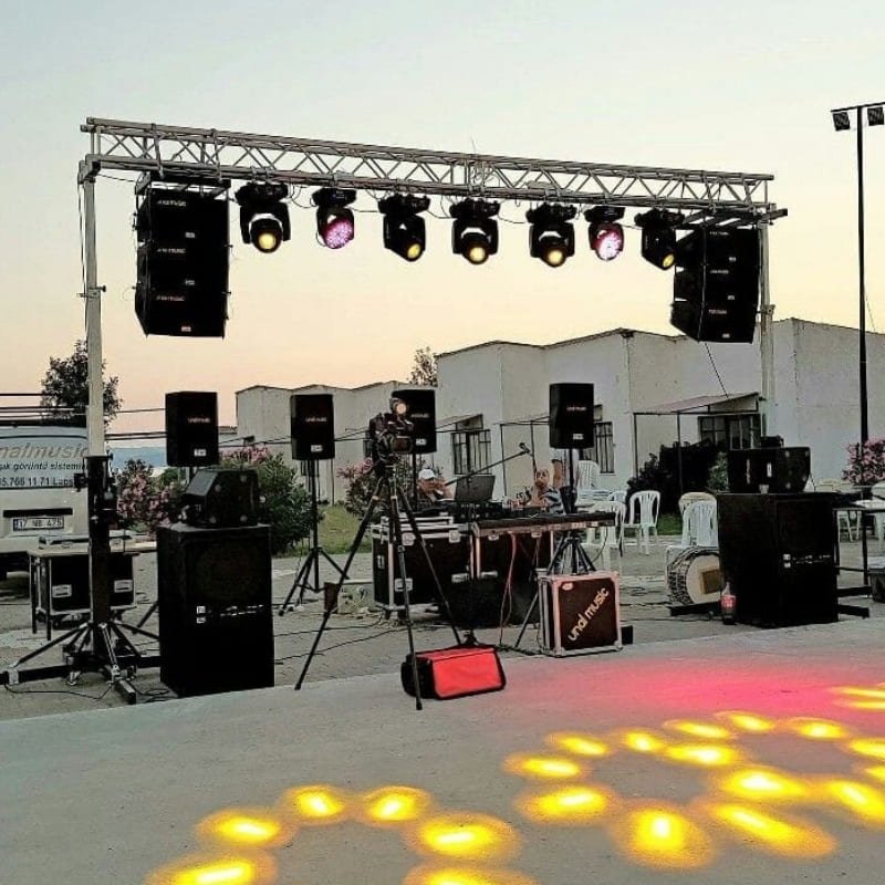 Professional DJ console and mixer in a full DJ setup